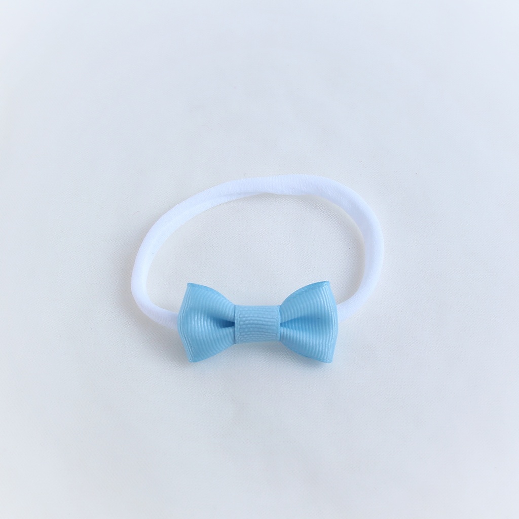 Повязка на голову "Репсовый бантик"  голубой