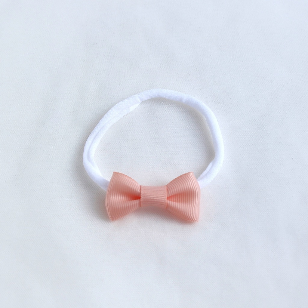 Повязка на голову "Репсовый бантик" персиковый