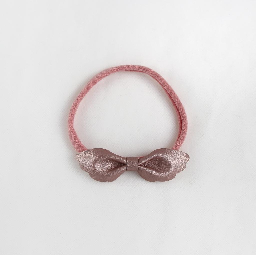 Повязка на голову "Бантик-крылья" розовое золото