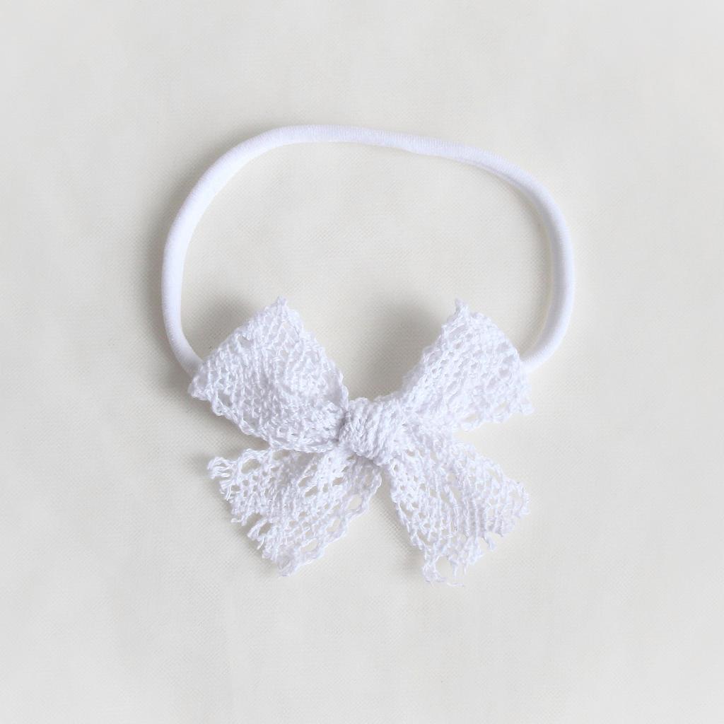Повязка на голову "Кружевной бантик" белый