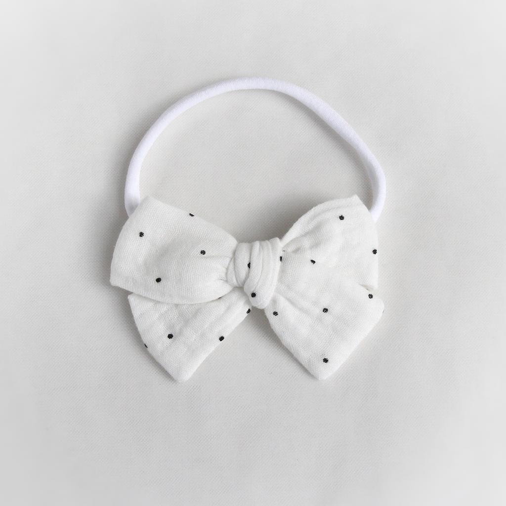 Повязка "Муслиновый бант" черный горошек на белом