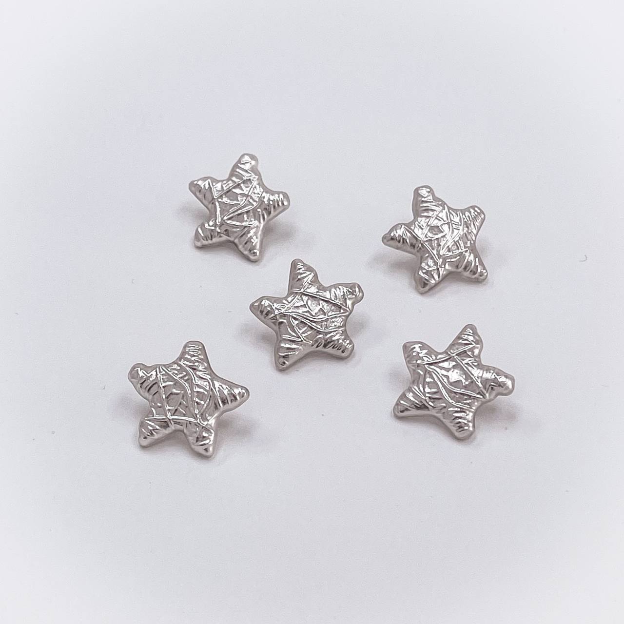 Набор декоративных серебряных пуговиц. Звучит как звезда
