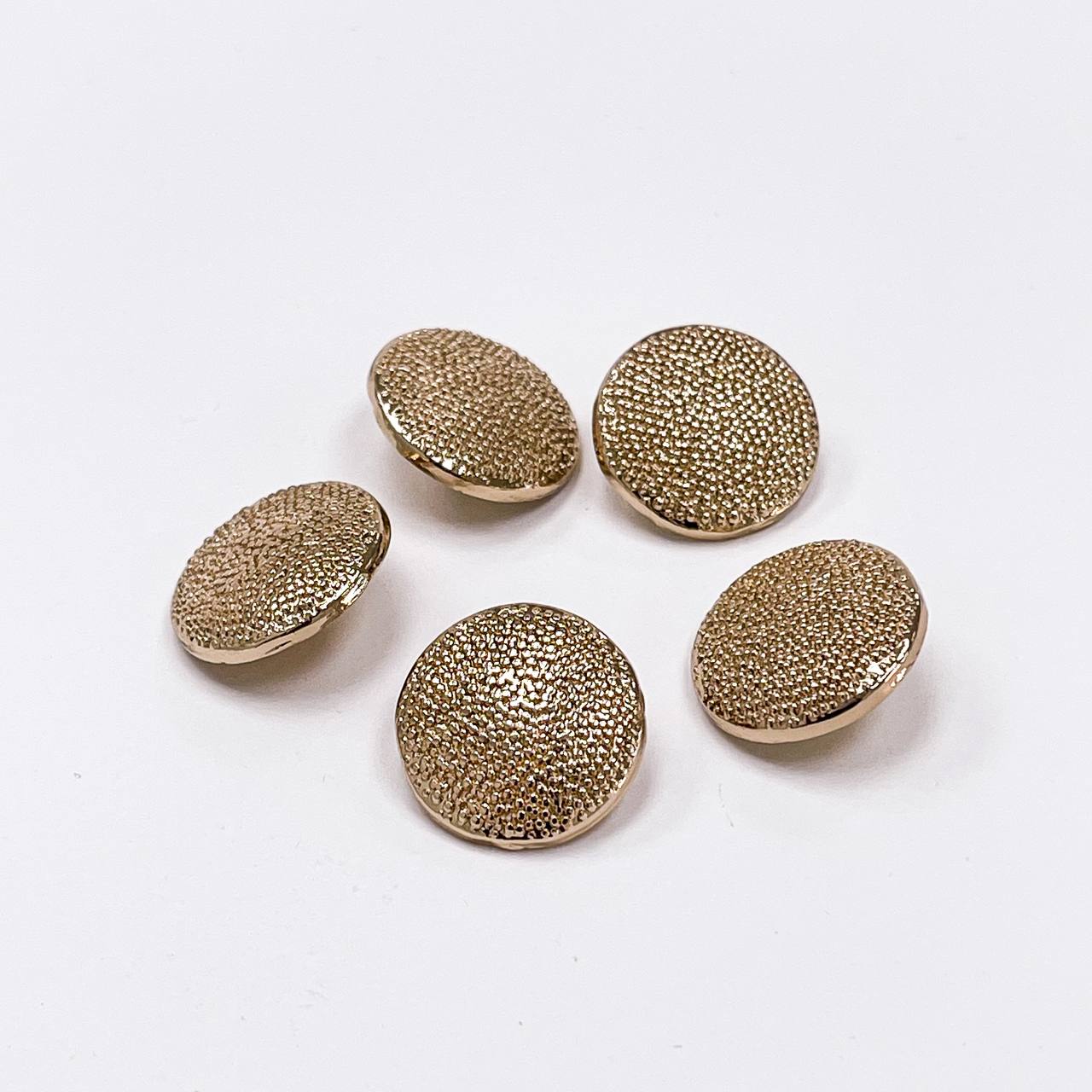 Набор декоративных золотых пуговиц. Звучит как дюна