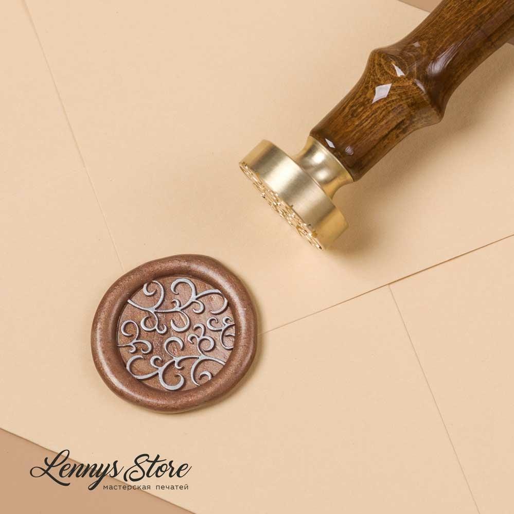 сургучная печать с завитушками