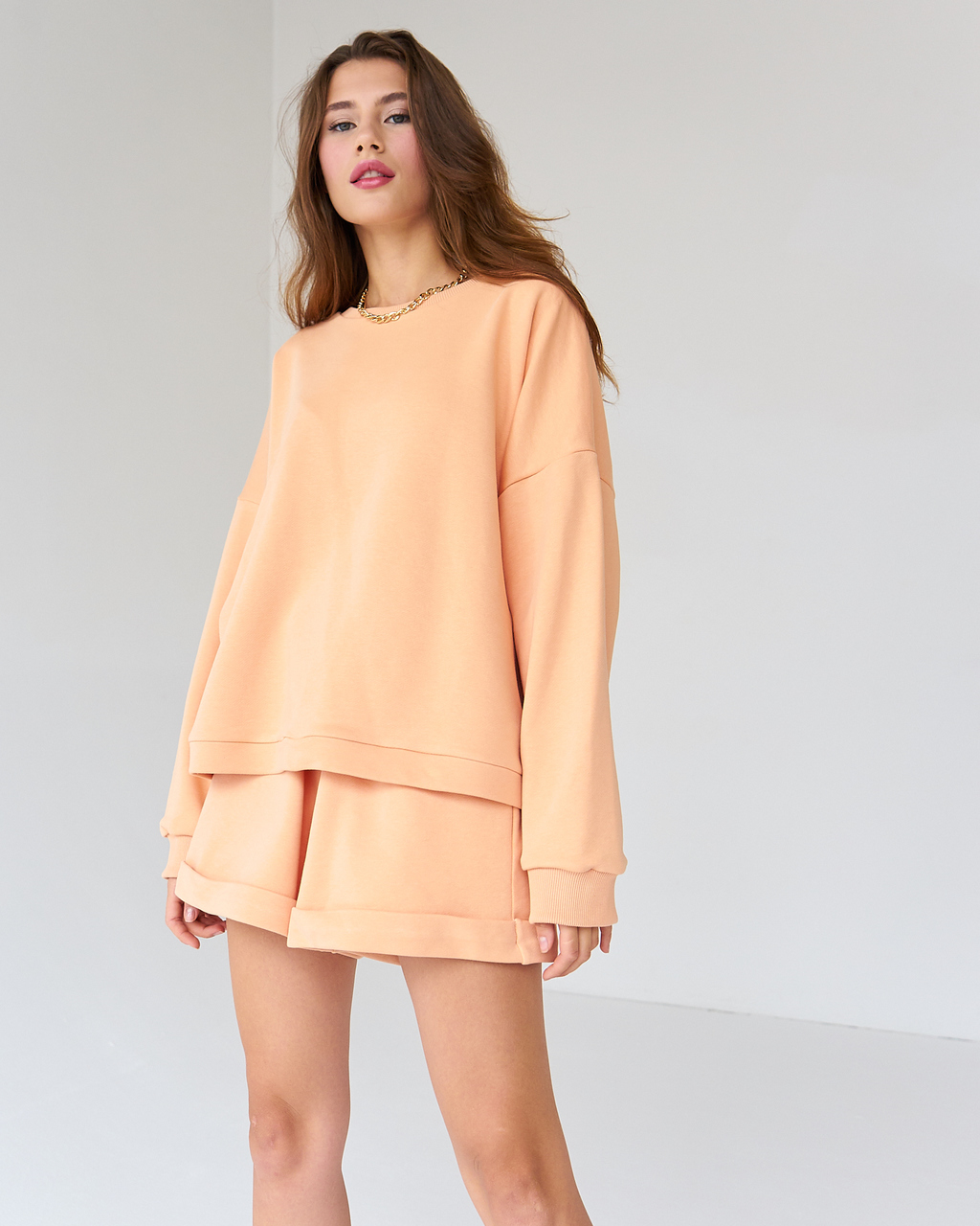 Комплект шорты и толстовка персикового цвета