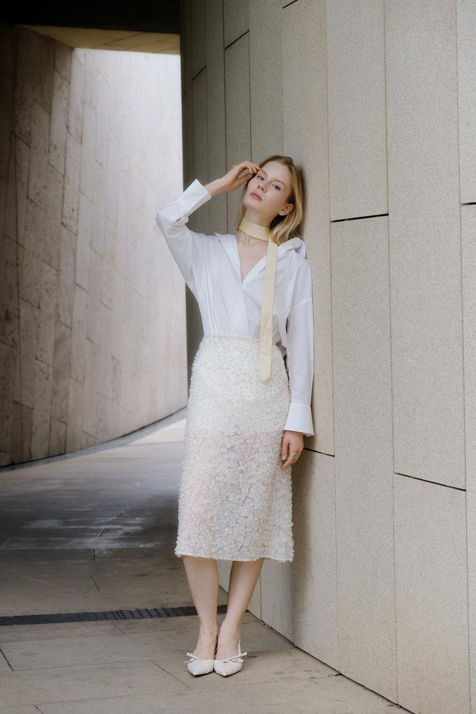 Юбка миди с выбитым цветком