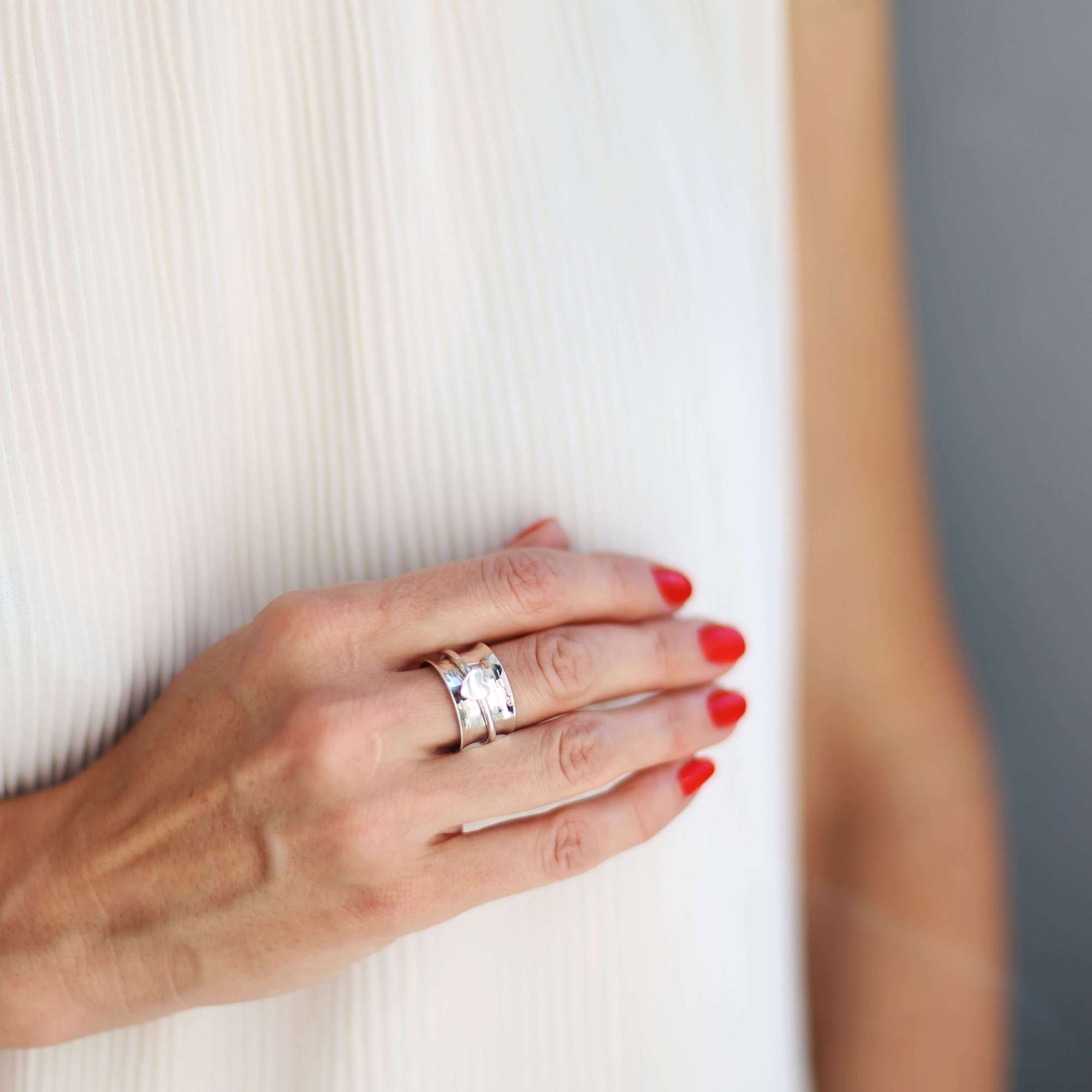 Серебряное кольцо с вращающимся сердечком 2P955