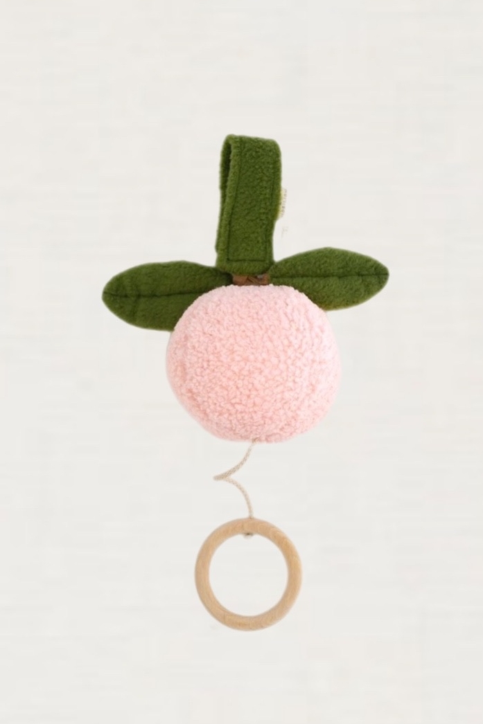 Музыкальная игрушка "Персик"