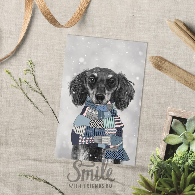 Такса в голубом шарфике на снежном фоне - открытка