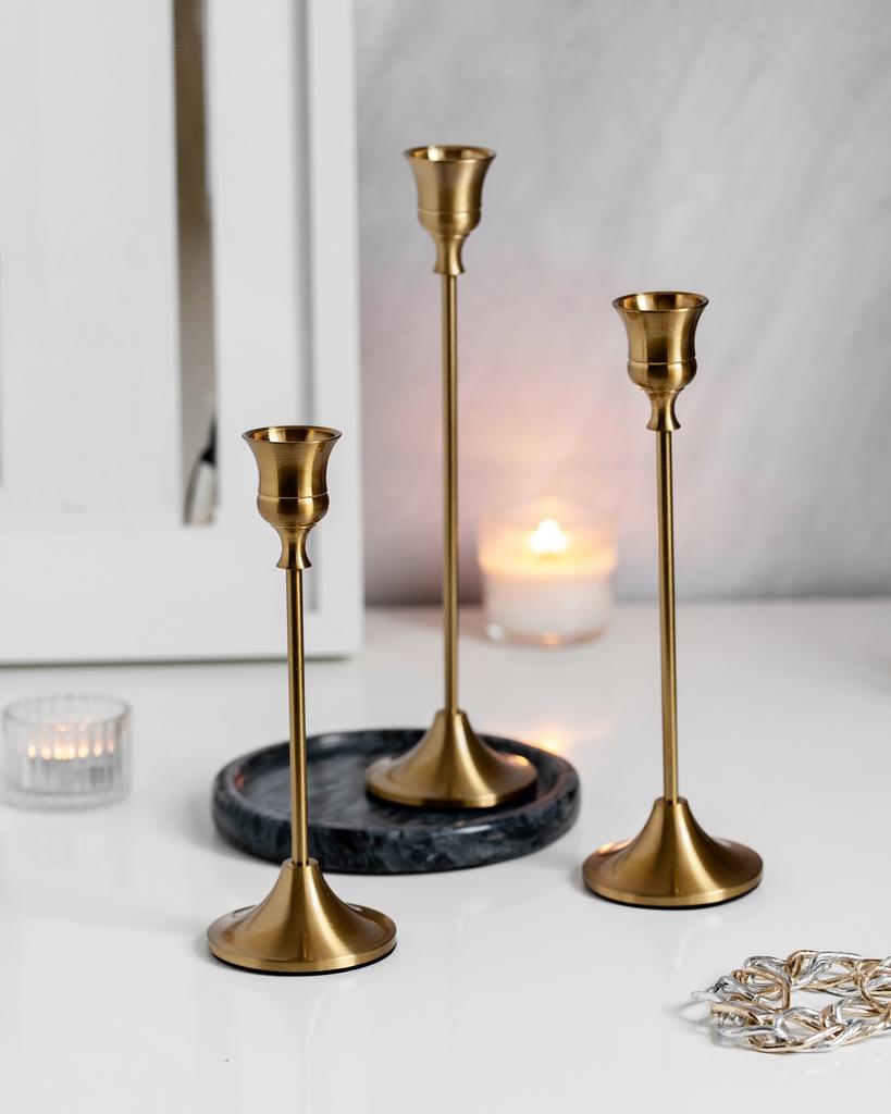 Подсвечники высокие золотые, сет из трех