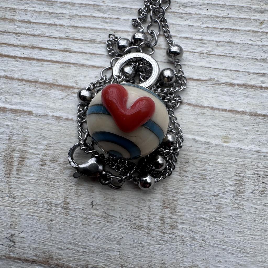 Coral heart steel dangle