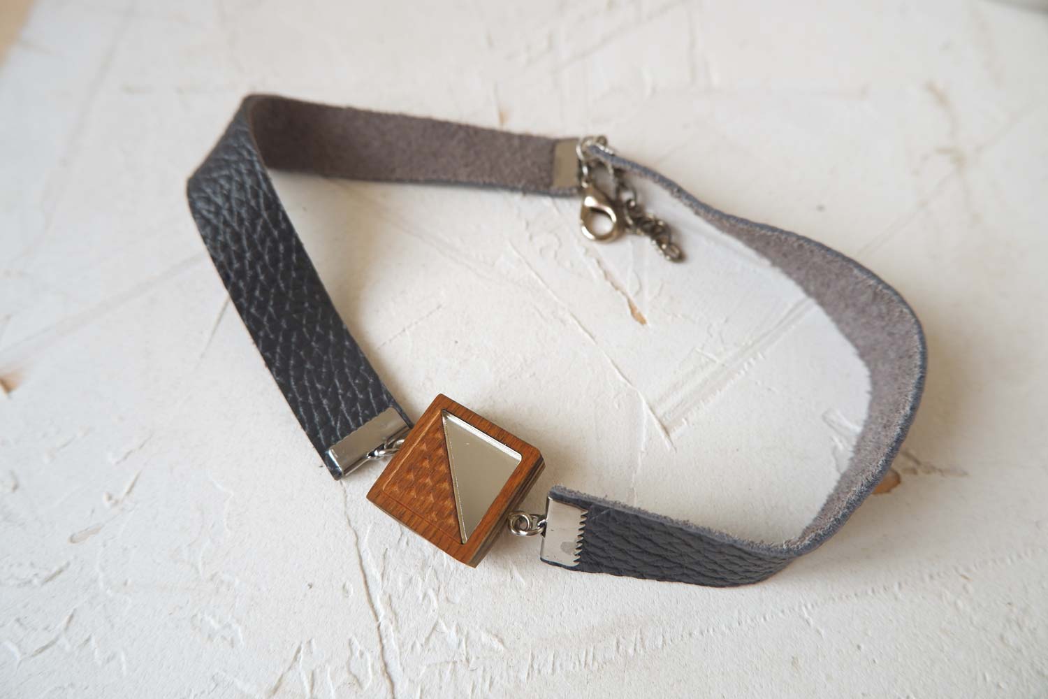 Квадрат с треугольниками - кожаный чекер