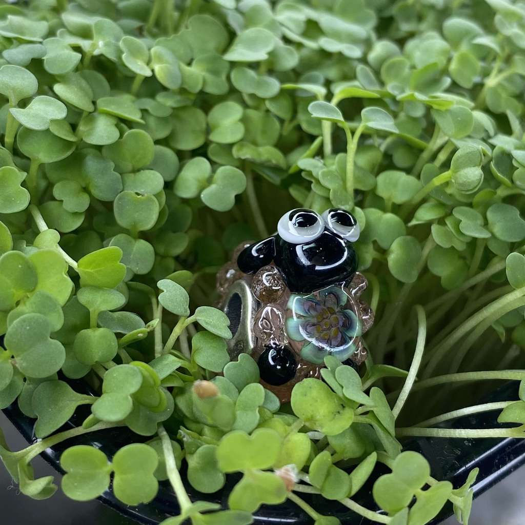 Sheep 11 tr pink with green/purple flower