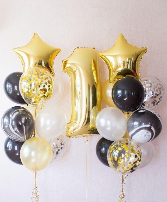 композиция из шаров на первый день рождения золотая цифра 1 и латекснык золотые,черные и шары с конфетти
