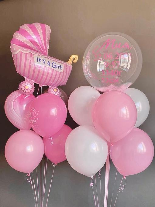 Композиция из шаров на выписку из роддома девочки