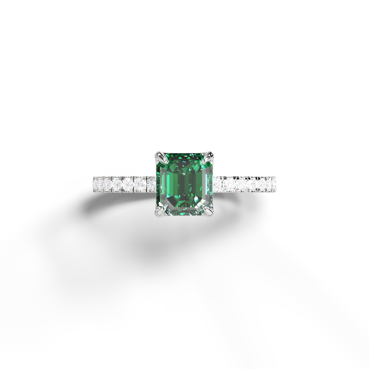 Кольцо с изумрудом на дорожке из бриллиантов