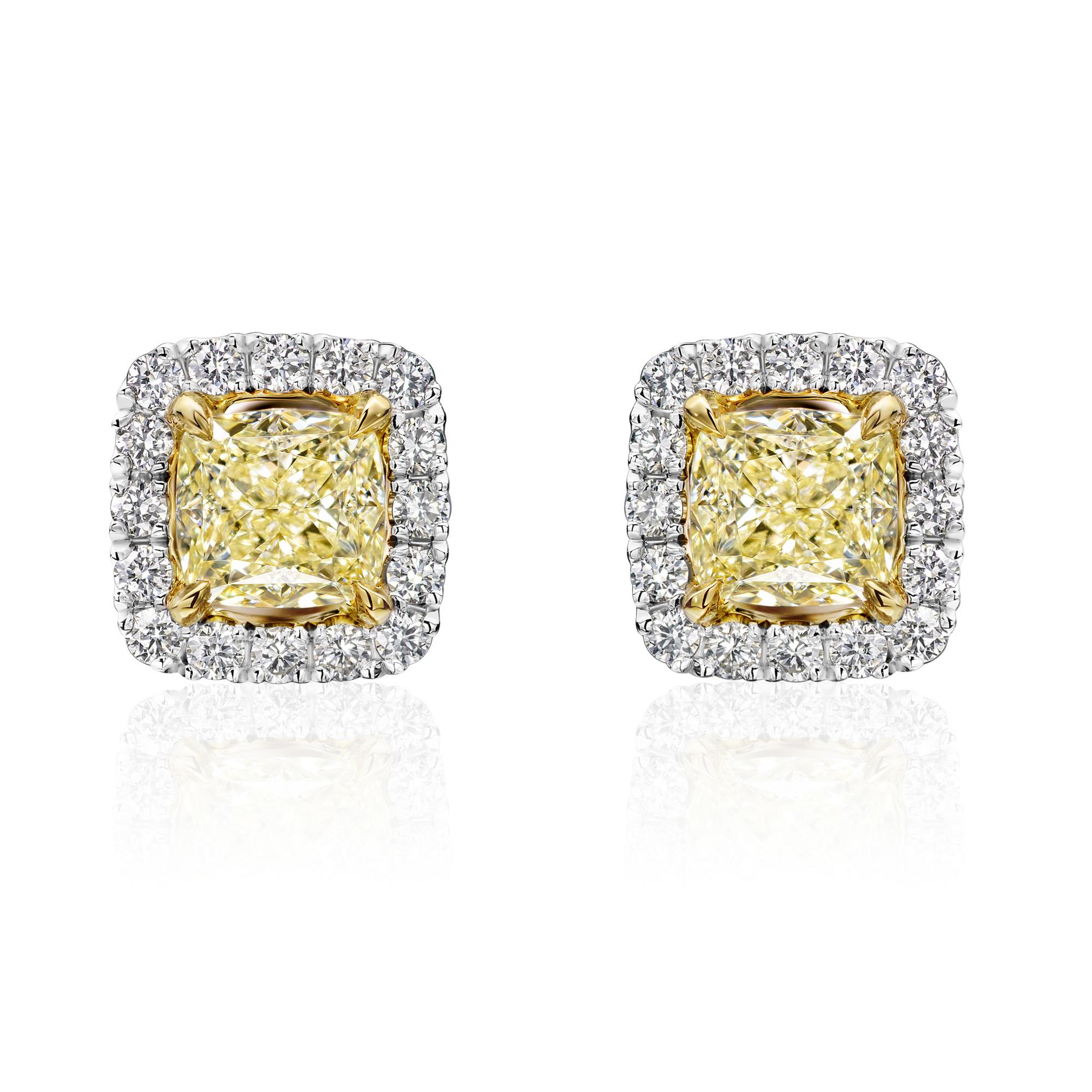 Серьги пусеты с желтыми бриллиантами 0.81 кт. и окантовкой