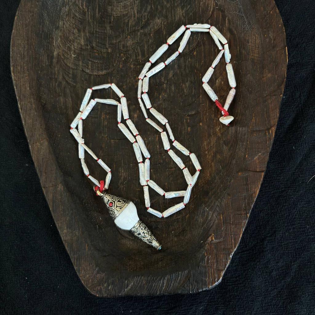 ожерелье из жемчуга с раковиной Шанкха с бусинкой из ракушки