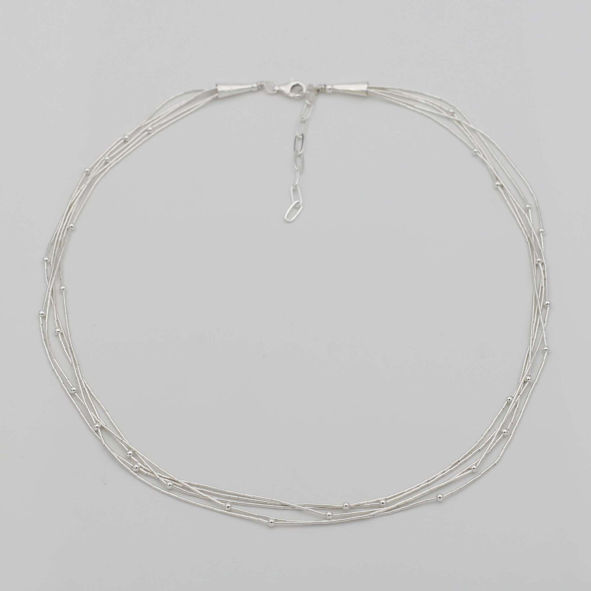 Колье из 5 серебряных нитей 4P508