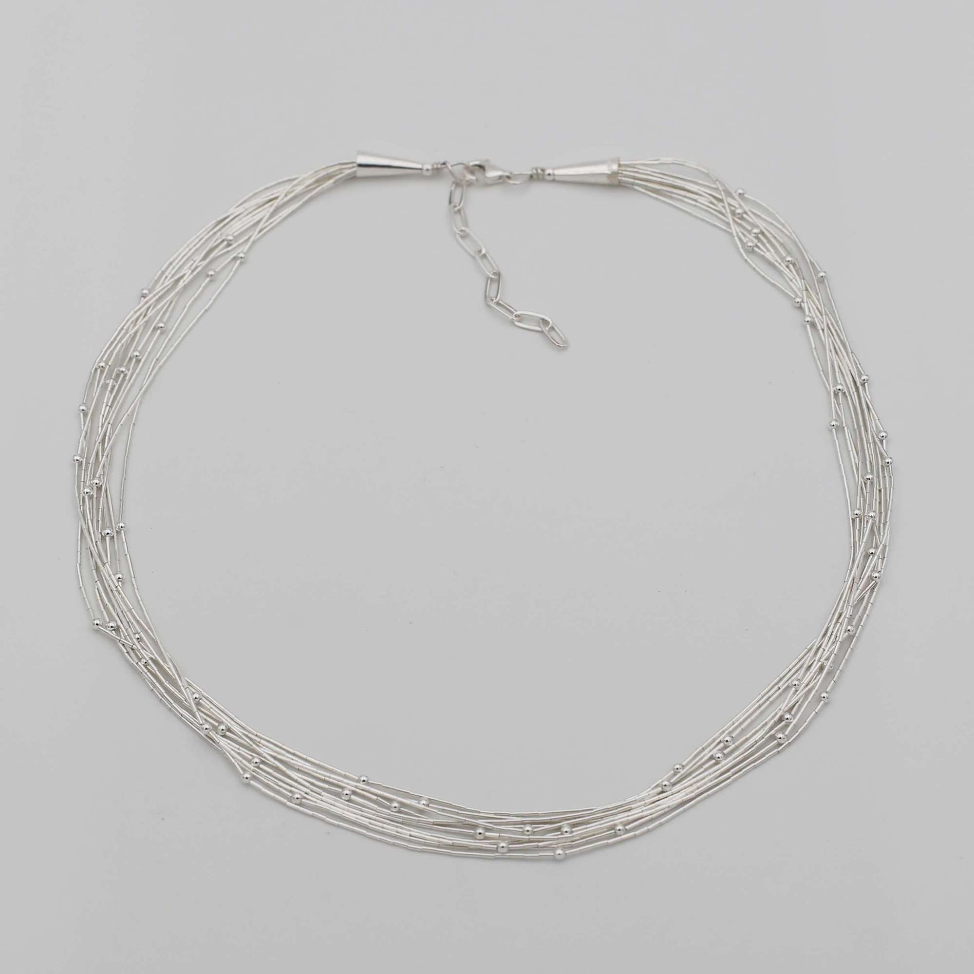 Колье из 10 серебряных нитей  4P509