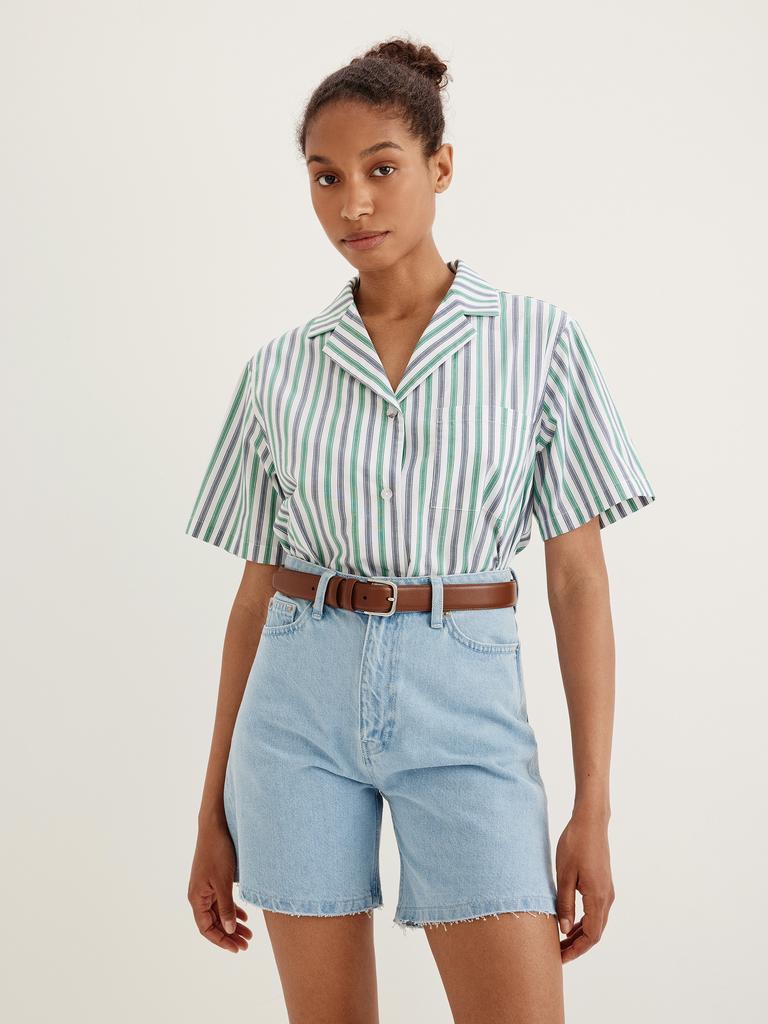 Шорты из денима с необработанным краем голубого цвета