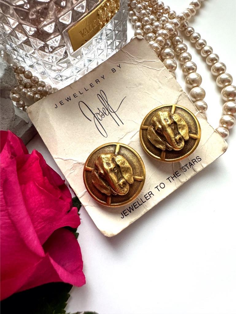 Круглые запонки со слонами