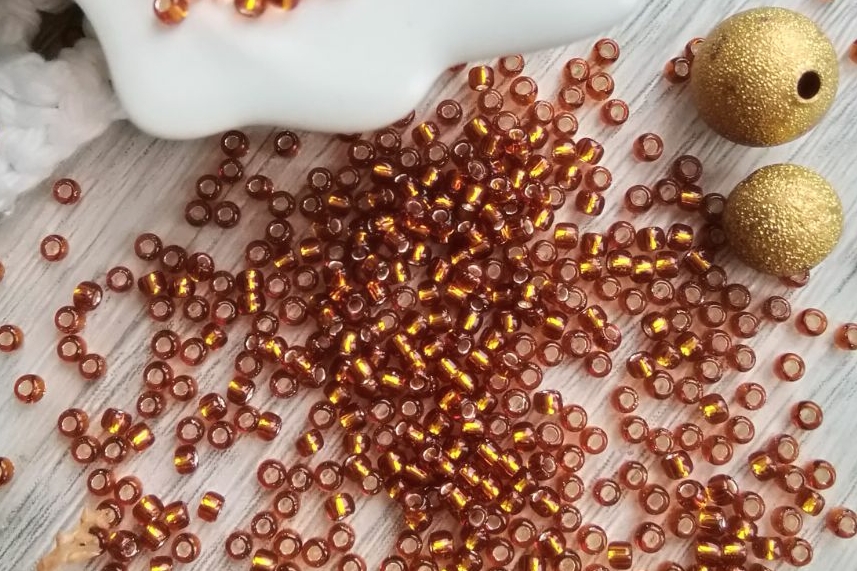 бисер Тохо круглый 11/0 янтарный коричневый 34