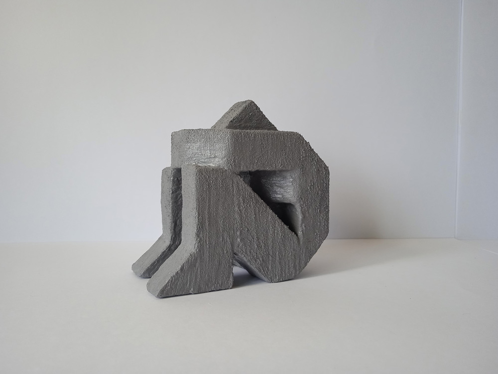 Человек кубопризматический в позе эмбриона