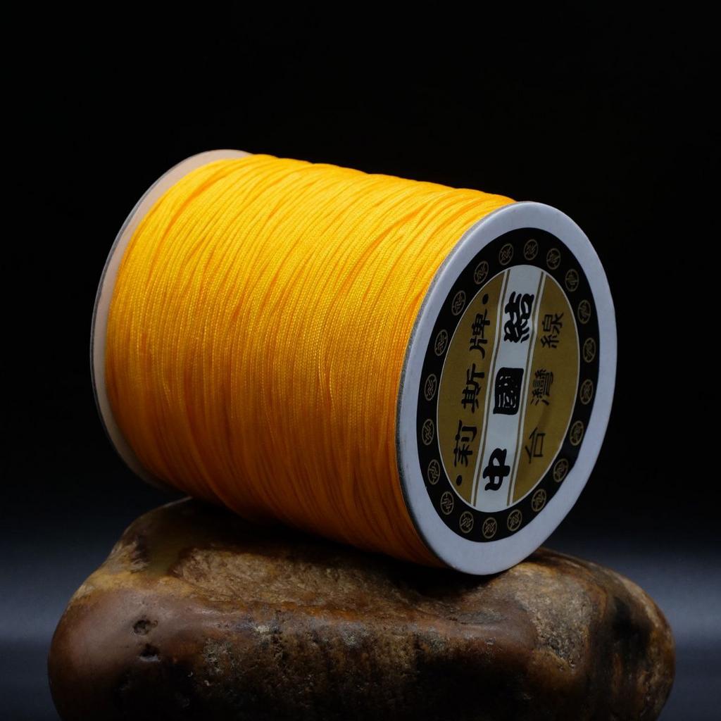 Нить для чёток жёлтая 1 мм