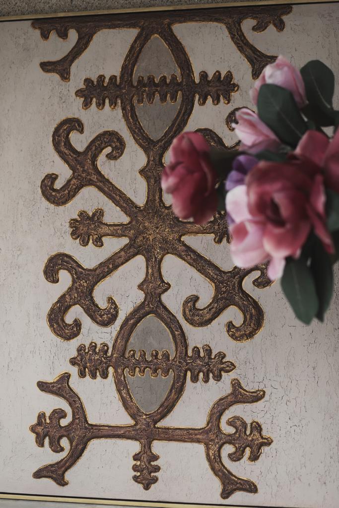 в Национальном стиле.