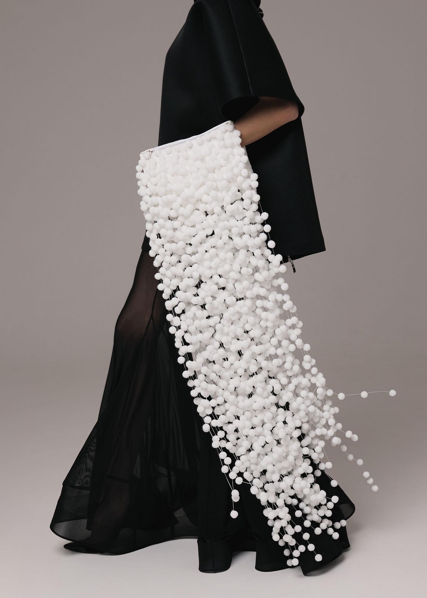 Clutch-muff with fur pompoms, milky