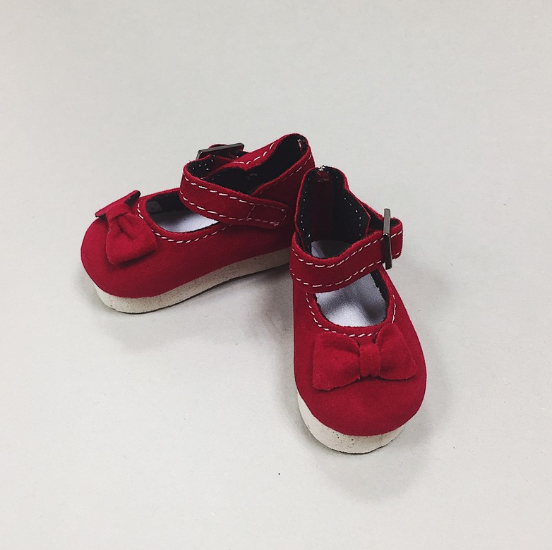 Red shoes with bow