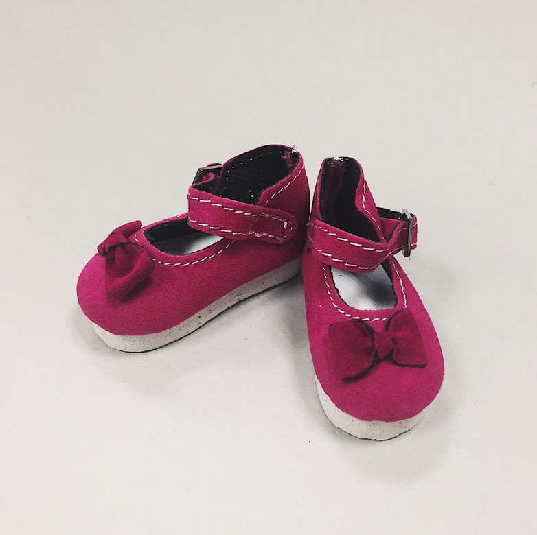Hot pink shoes with bow