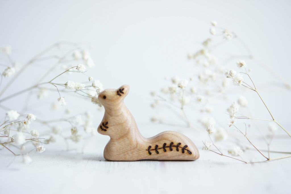 Little squirrel standing twig
