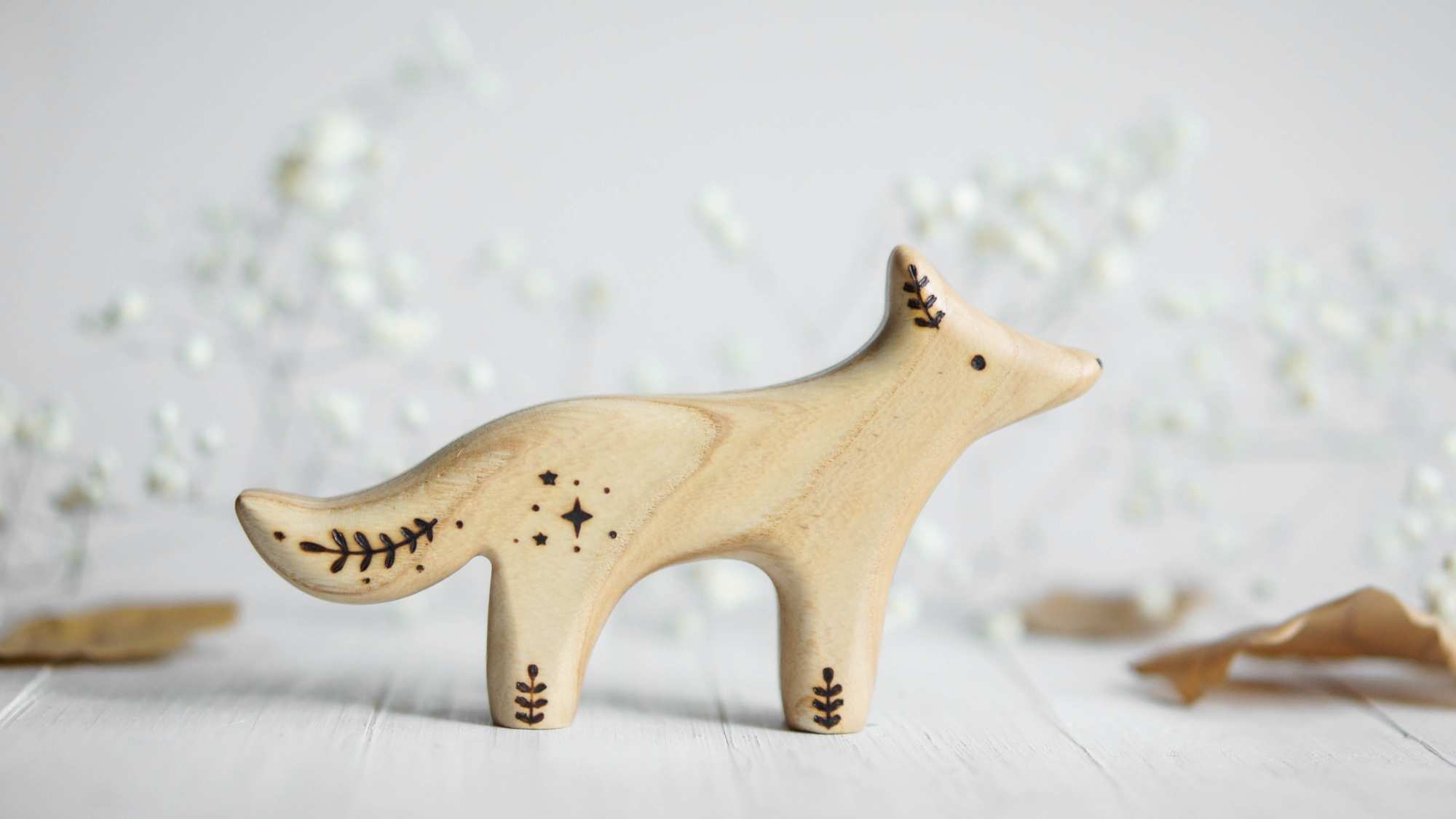 Wooden she-wolf toy