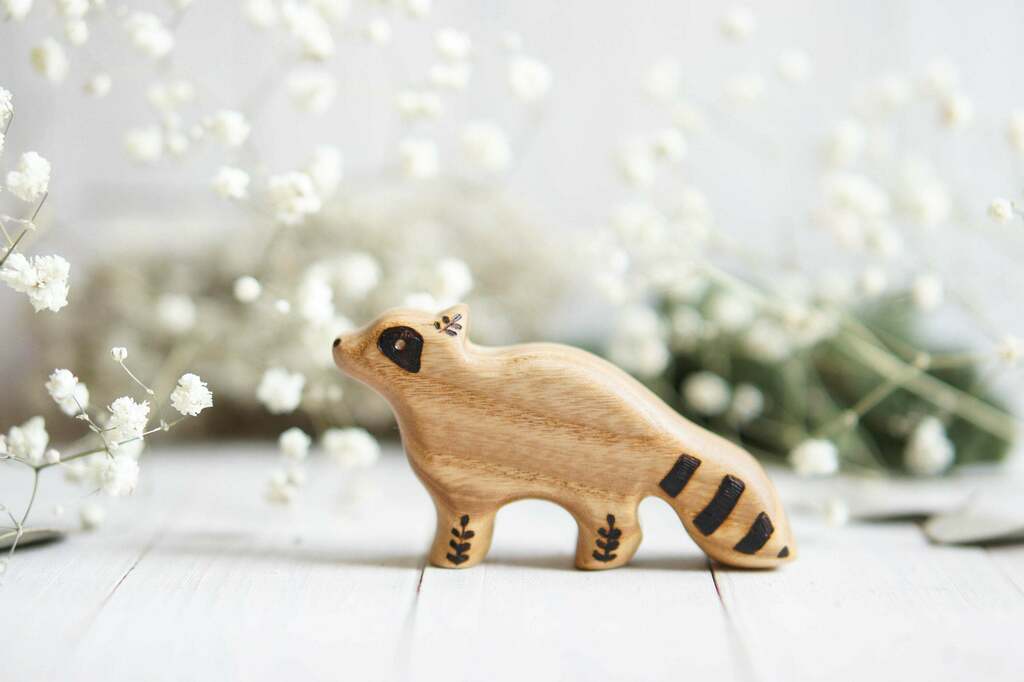 Baby raccoon wooden toy