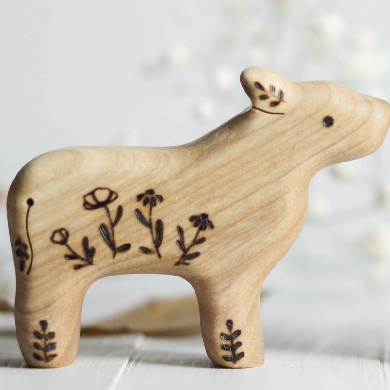 Wooden calf toy (floral)