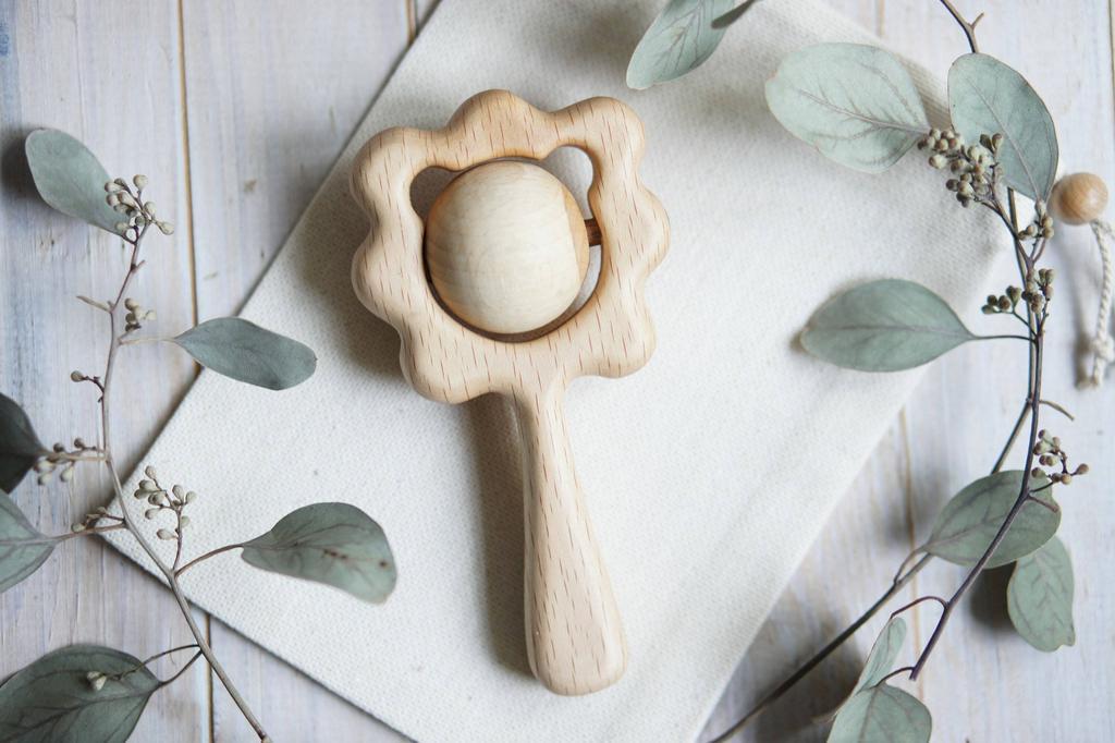 Traditional wooden llion rattle