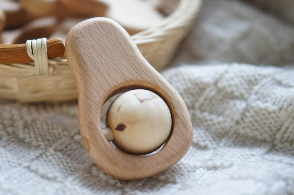 Traditional wooden avocado rattle