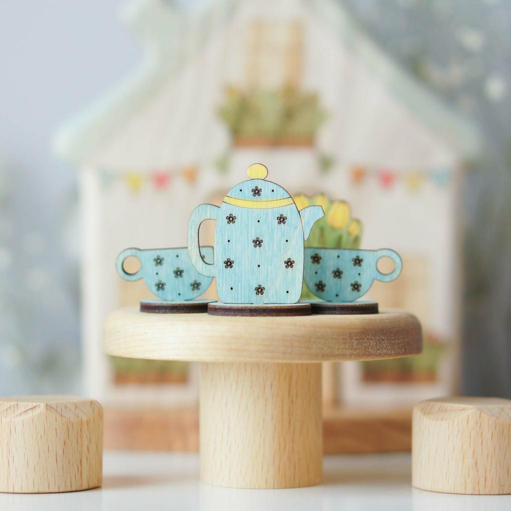 Tea set (Blue teapot and cups and yellow tulips)