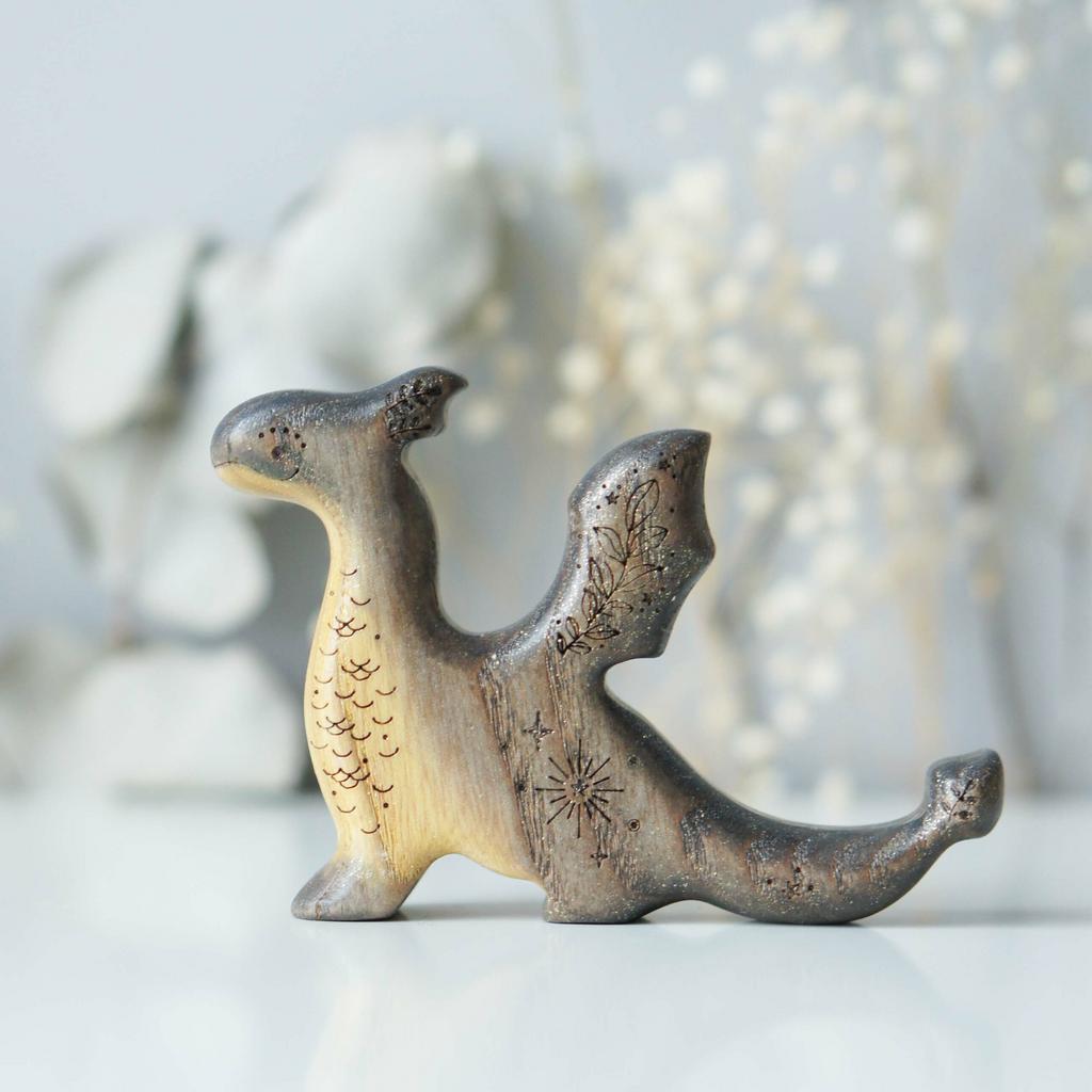 Baby dragon (black and gold sparkle)