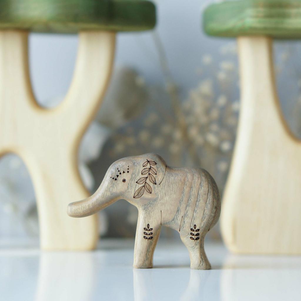 Elephant baby trunk up wooden toy (colored)