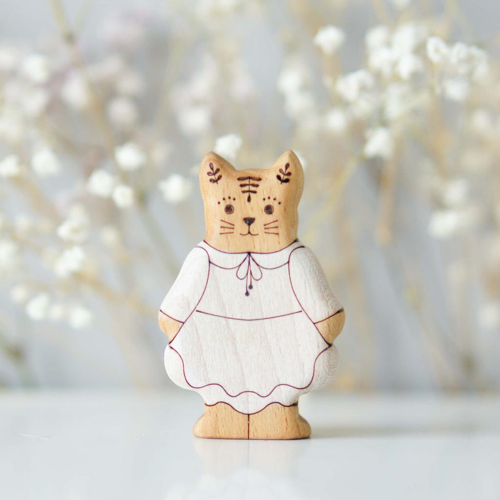 Tom Kitten's sister (in a white dress)