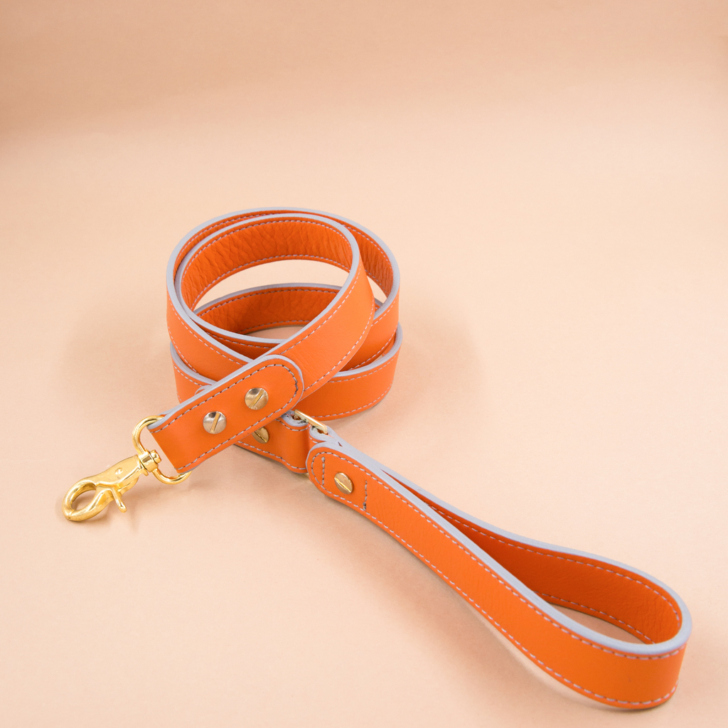 Поводок  кожаный оранжевый 1,2 м