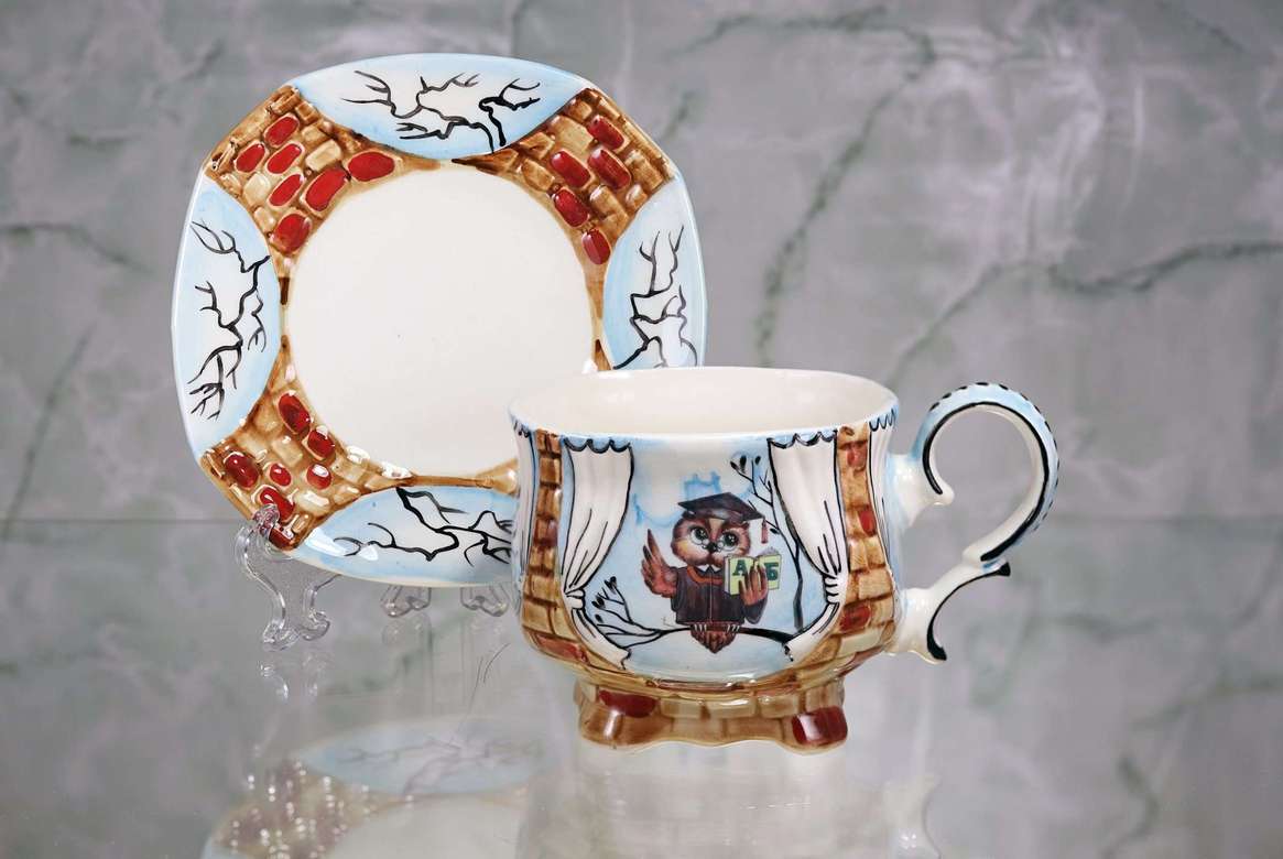Handmade porcelain tea cup and saucer "Owl Teacher"