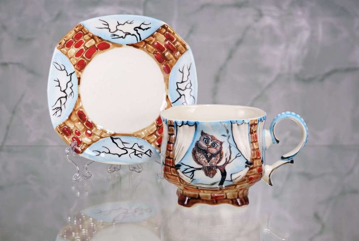 Handmade porcelain tea cup and saucer "Mother owl"