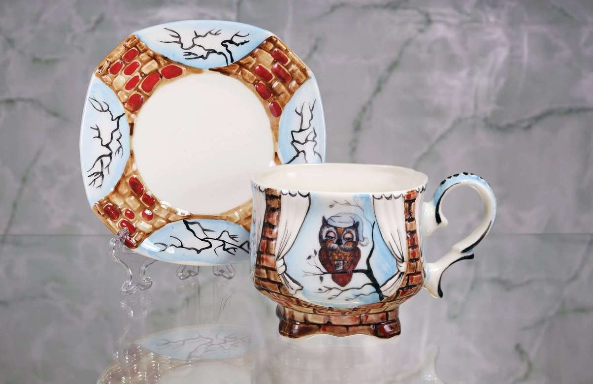Handmade porcelain tea cup and saucer “Owlet in a cap"