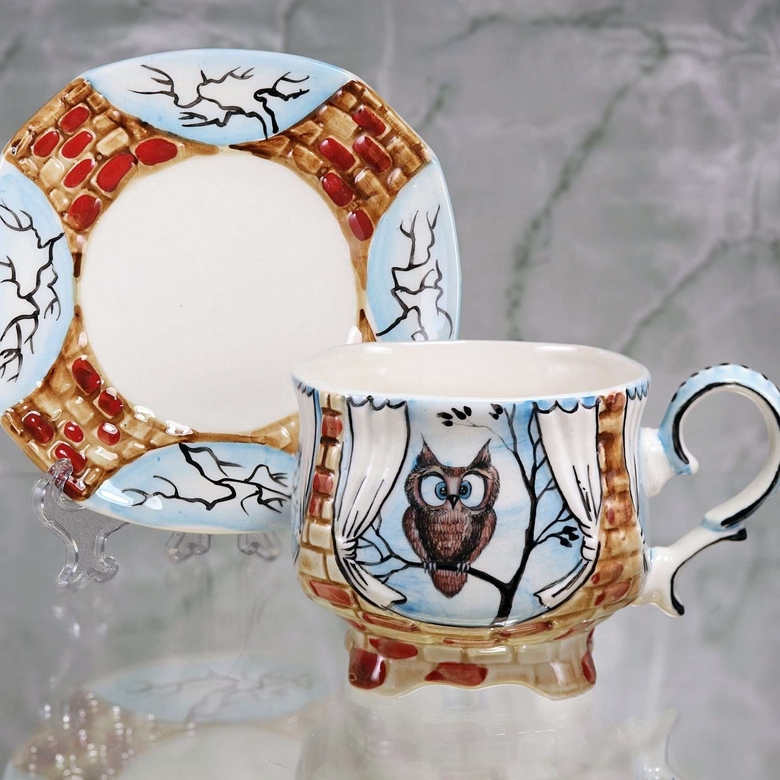 Handmade porcelain tea cup and saucer “Owl”
