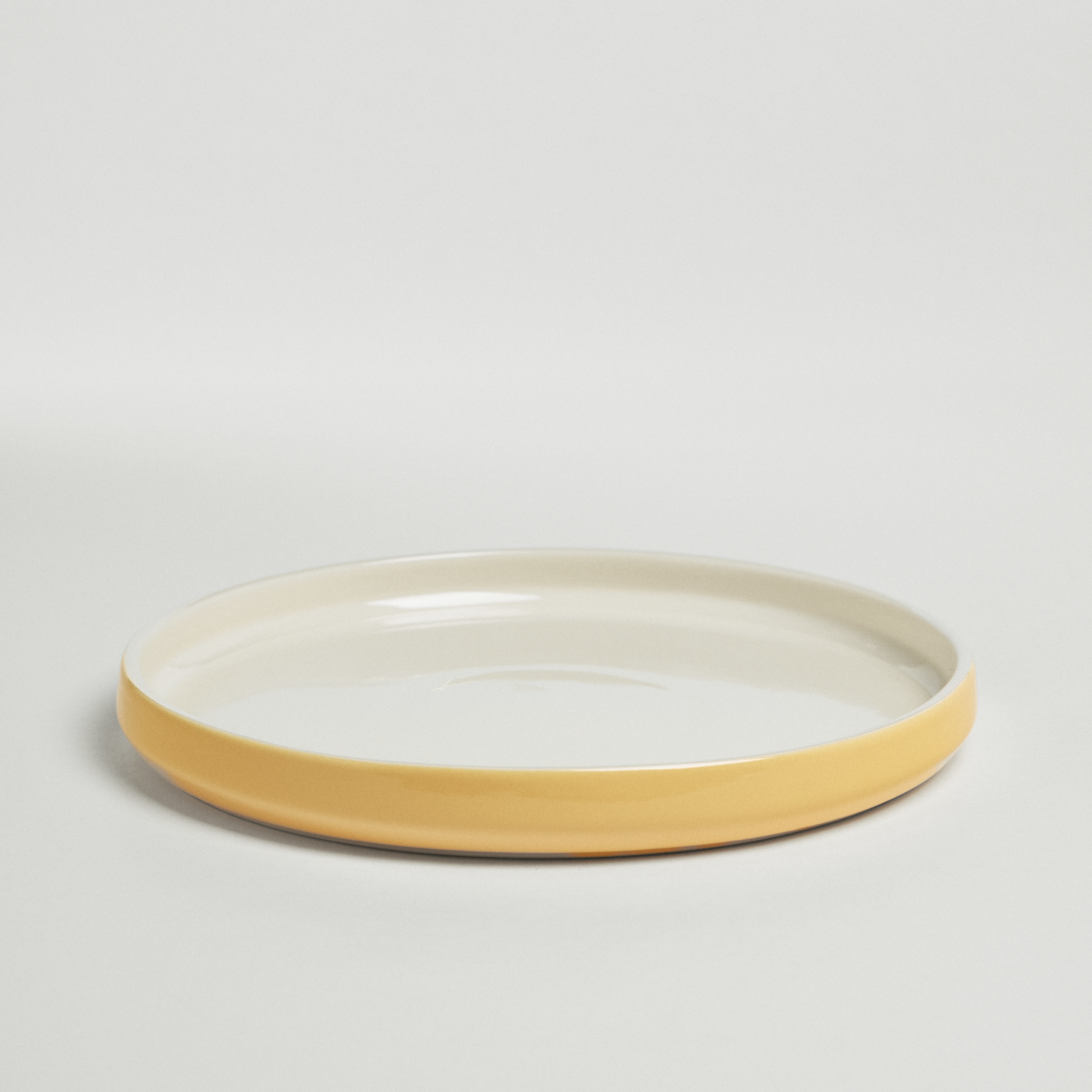 Тарелка 16/22 см. Цвет желтый.