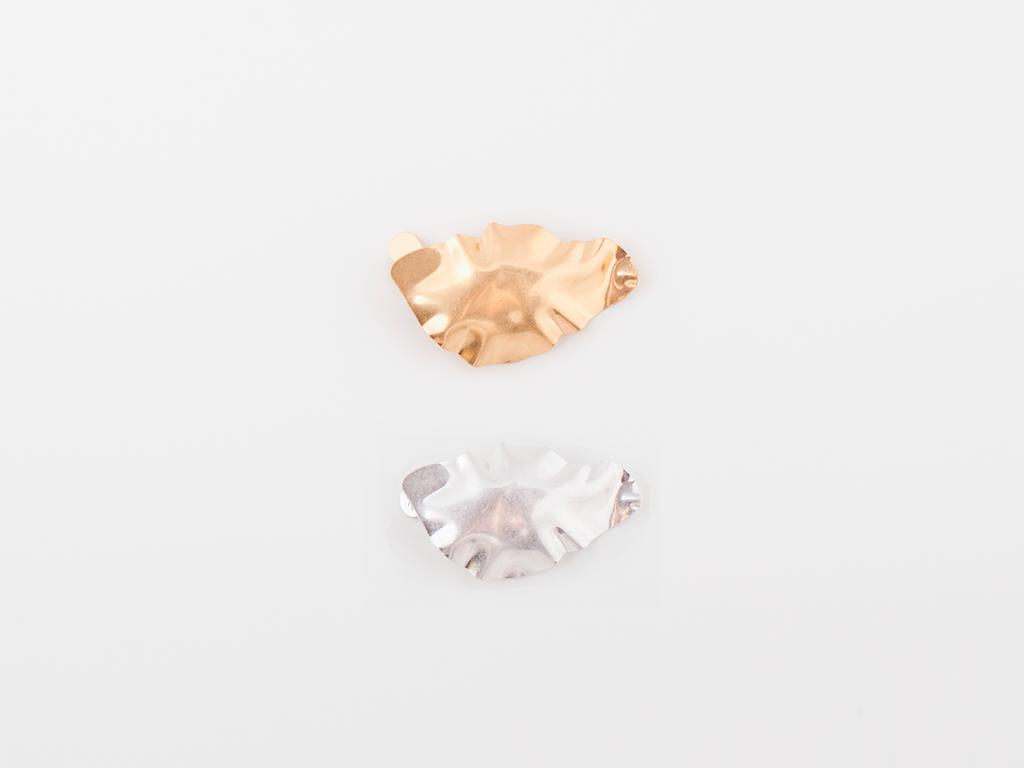 Зажим "Тиаки"